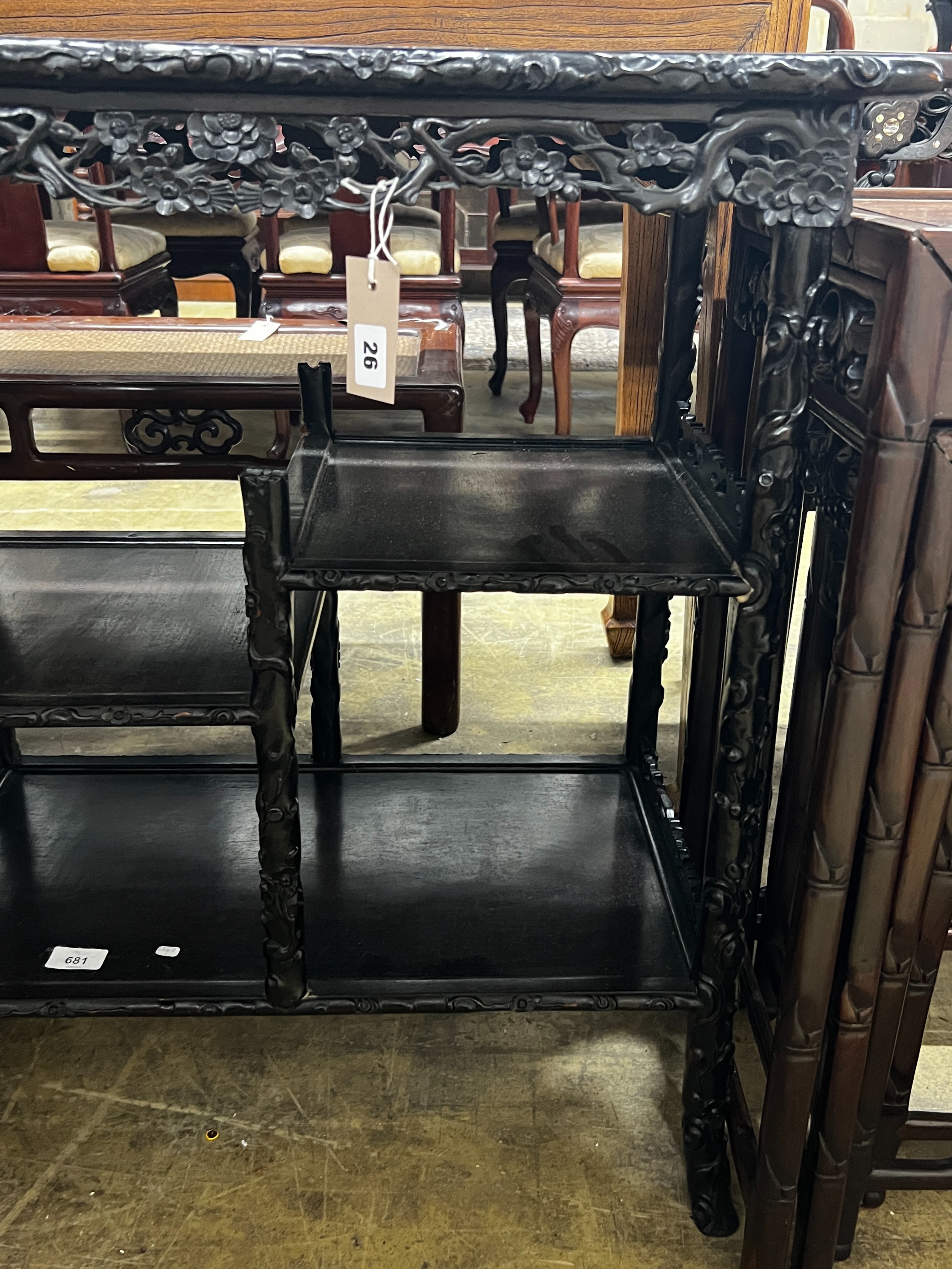 A Chinese rectangular carved hongmu tiered display table, length 67cm, depth 38cm, height 78cm *Please note the sale commences at 9am.
